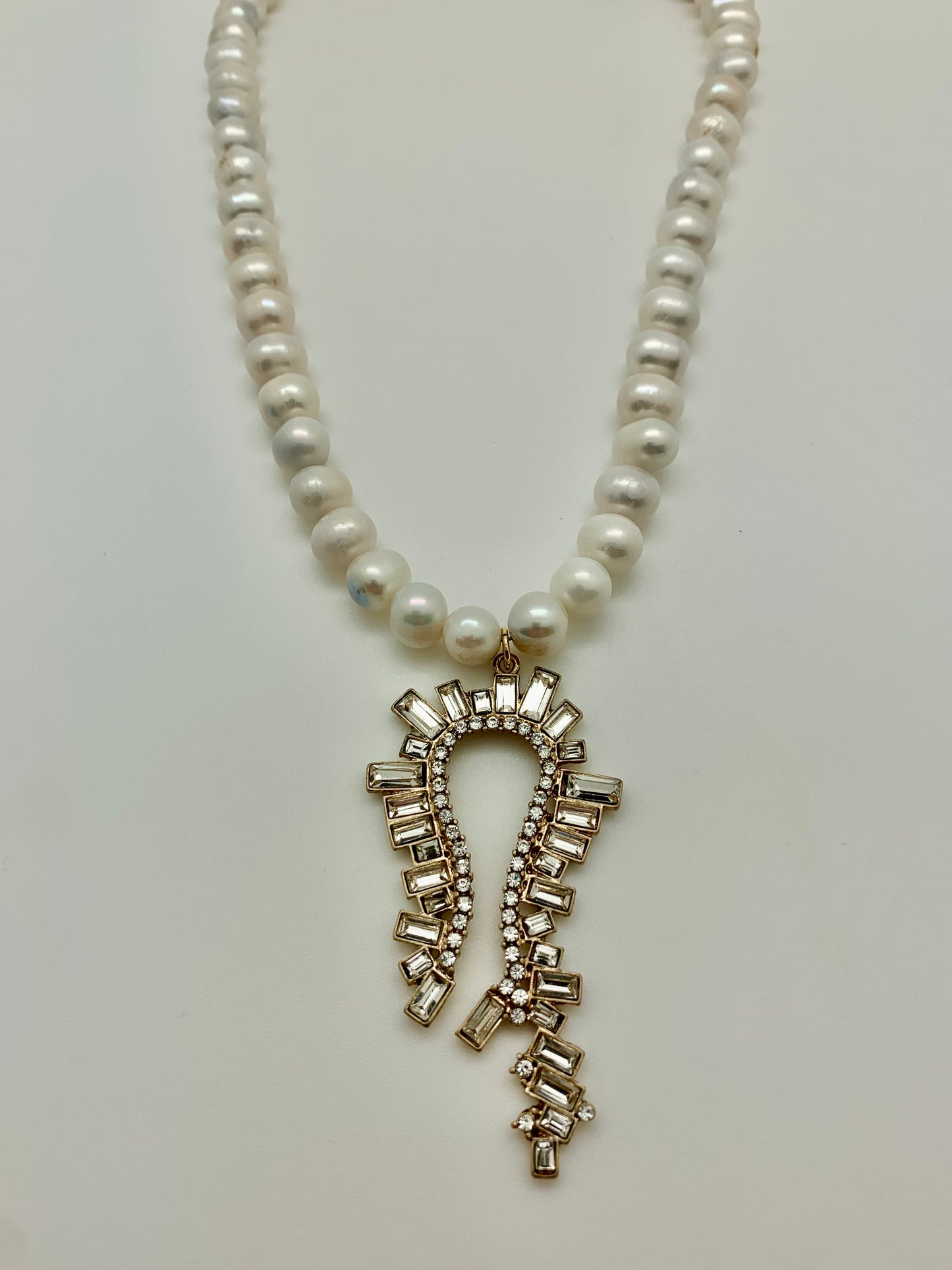 Fresh water pearls with crystal pendant