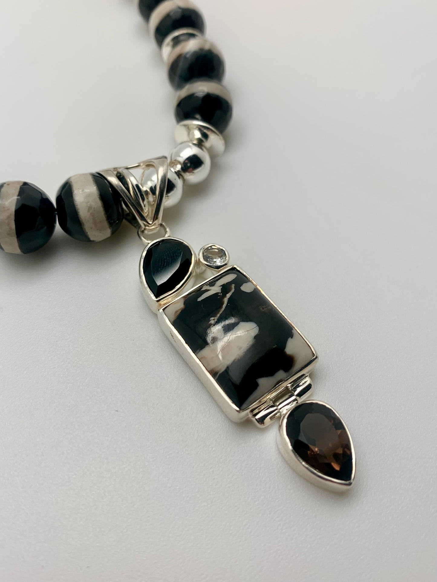Onyx and cream beads with pendant