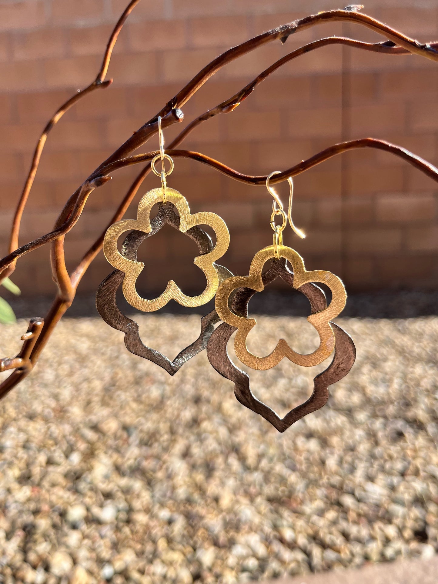 Gold and gun metal earring