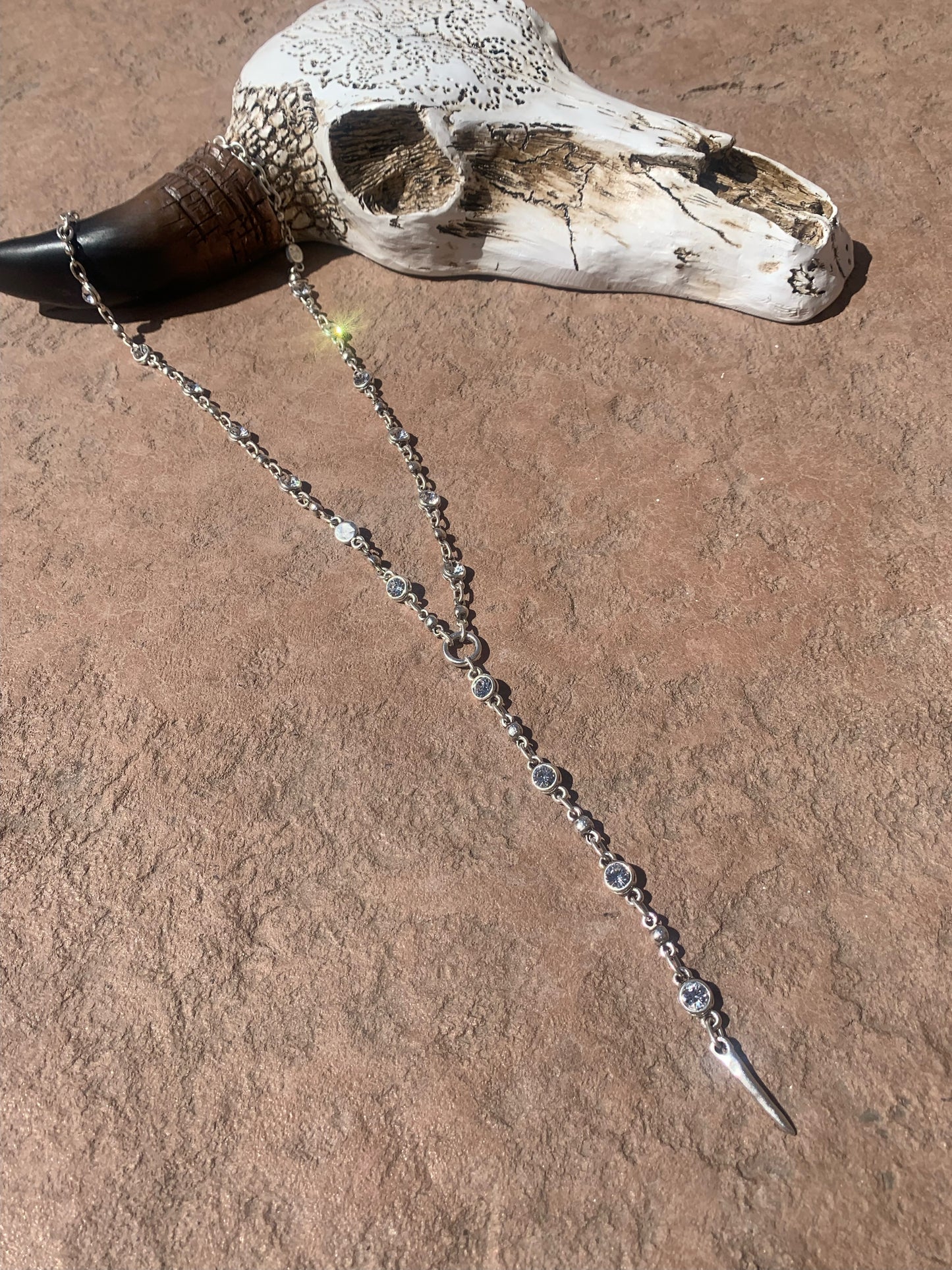 Long silver and diamond lariat