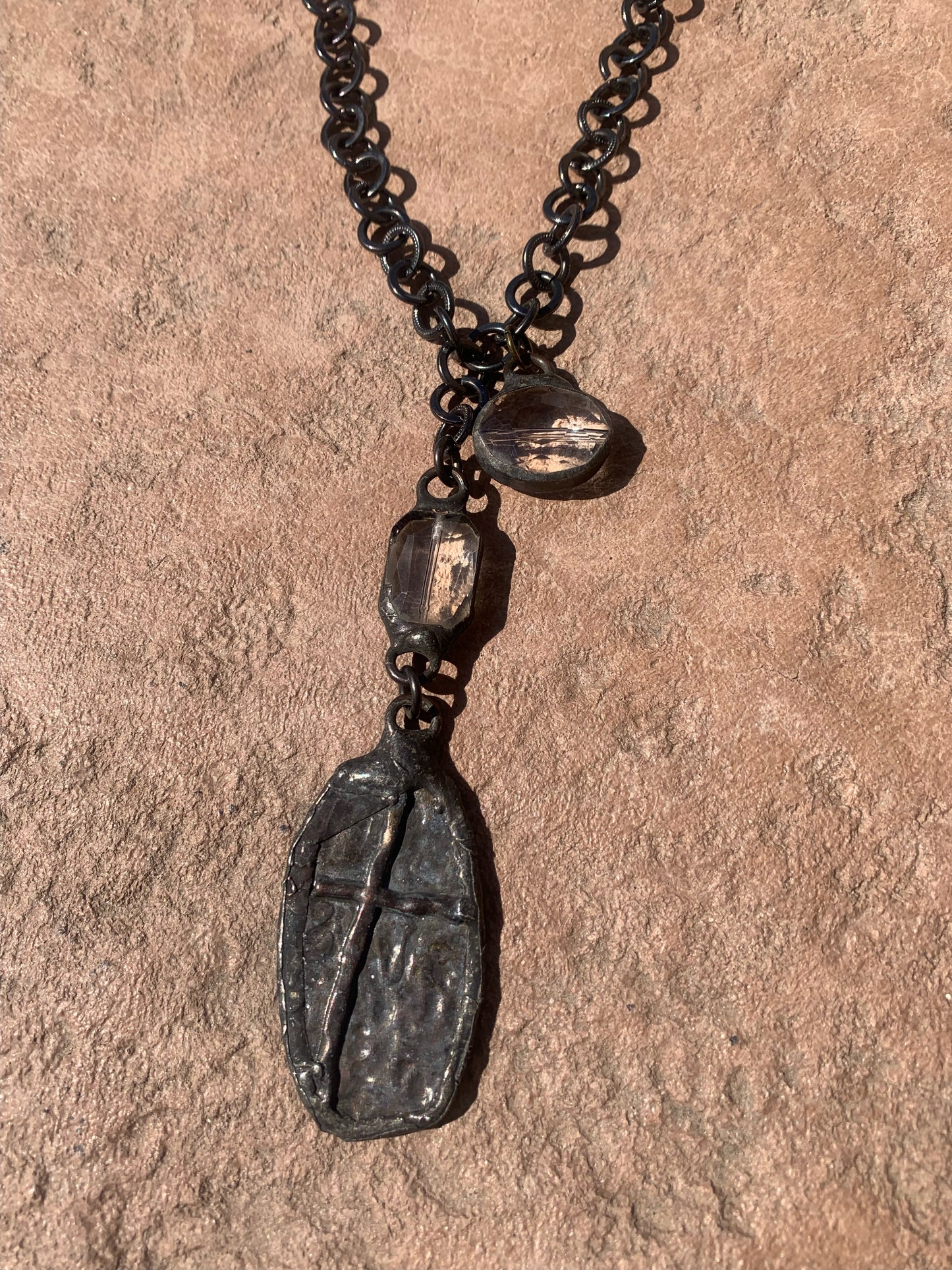 Gunmetal chain with crystals and cross