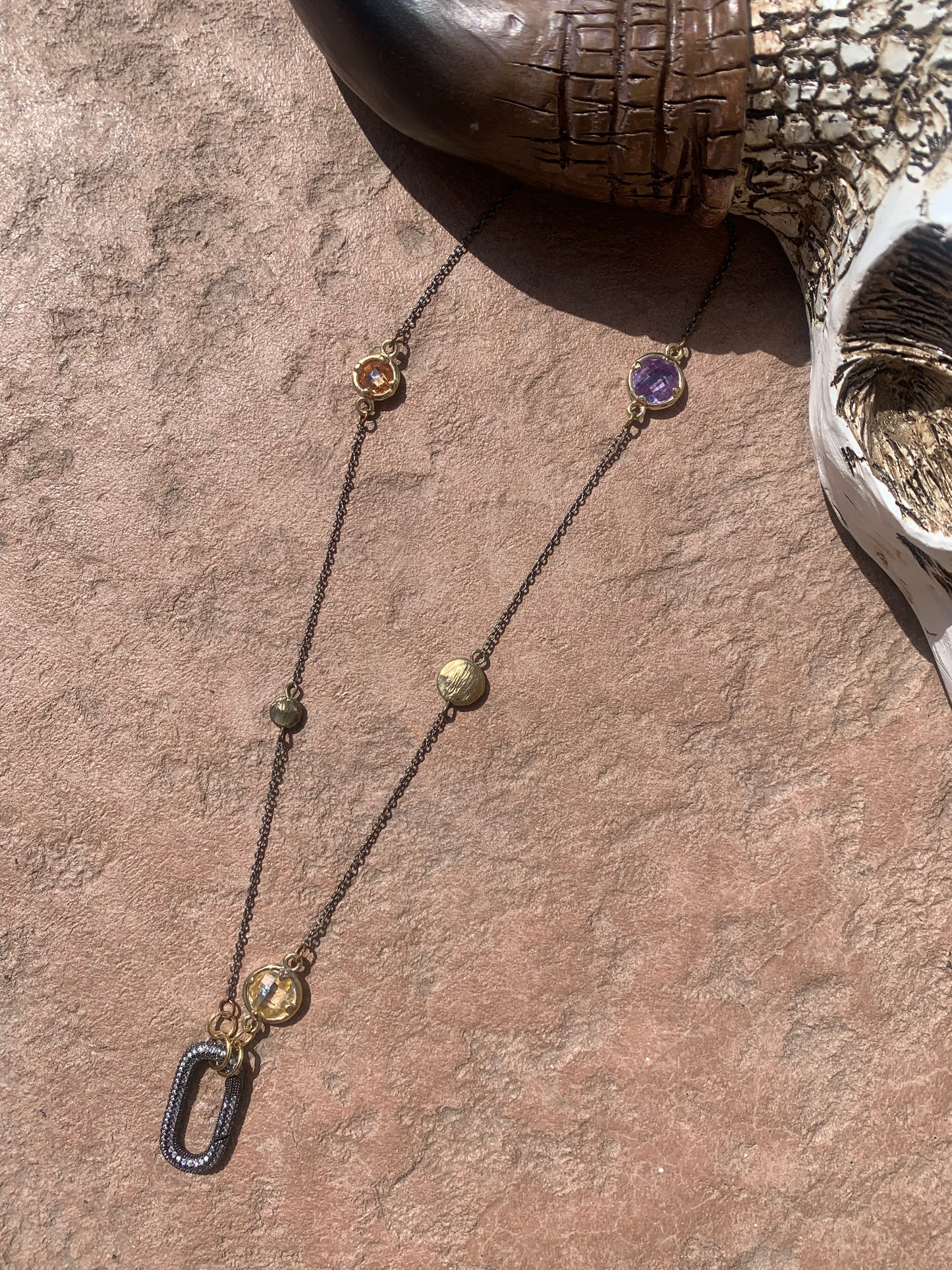 Mini gunmetal carabiner on gunmetal chain with multi colored stones
