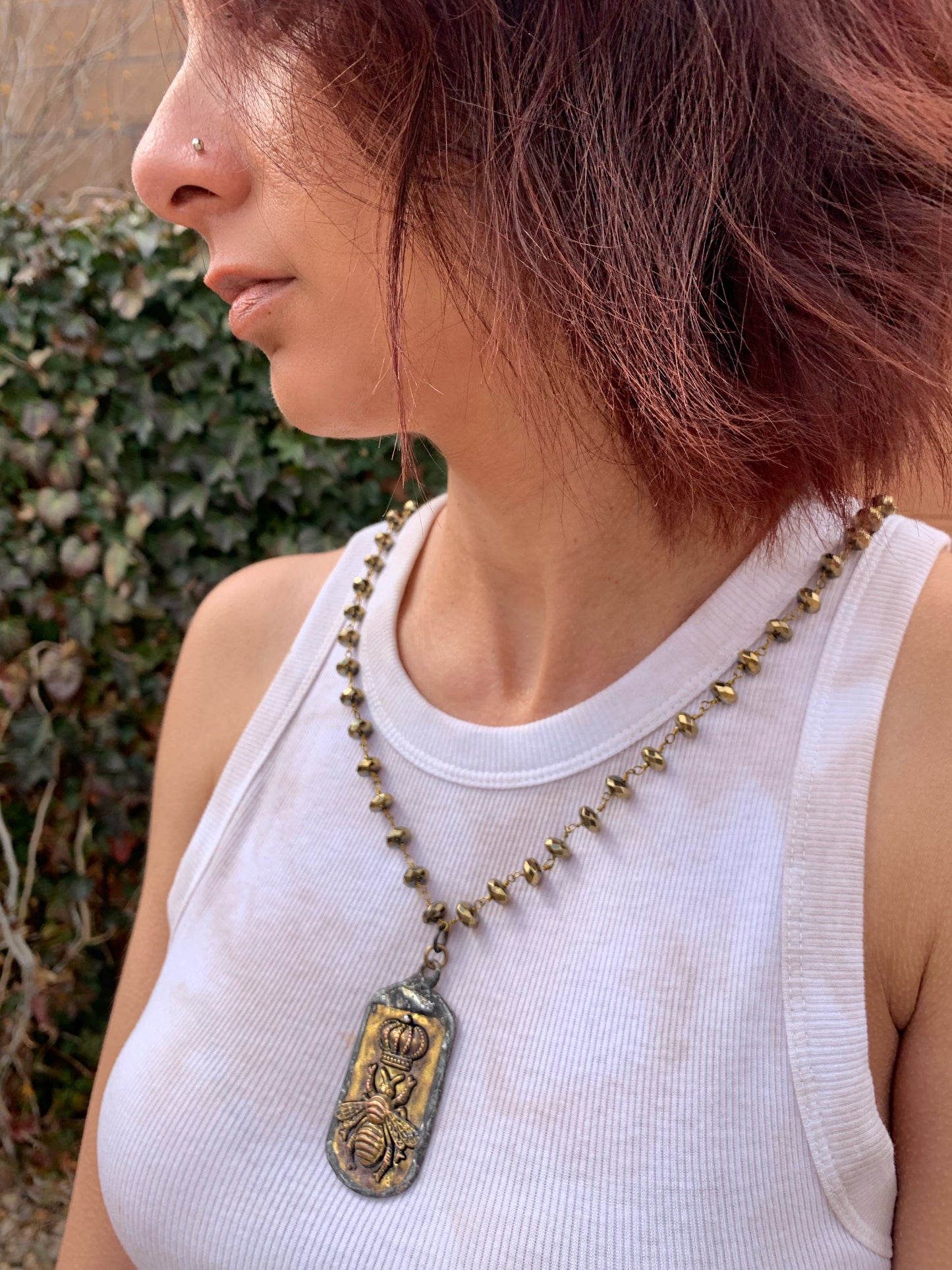 Long gold with bee pendant
