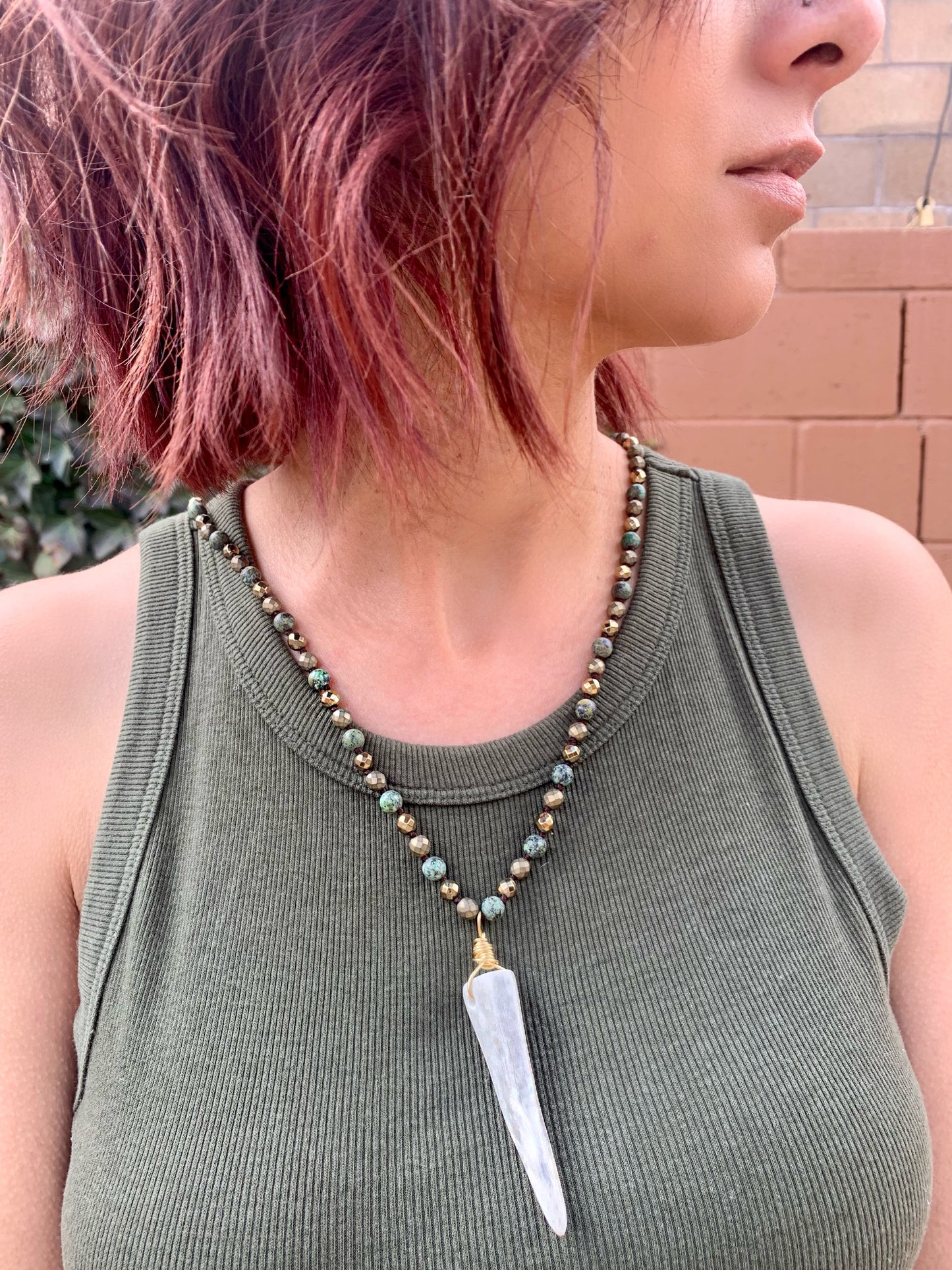 Gold and green stones with turquoise