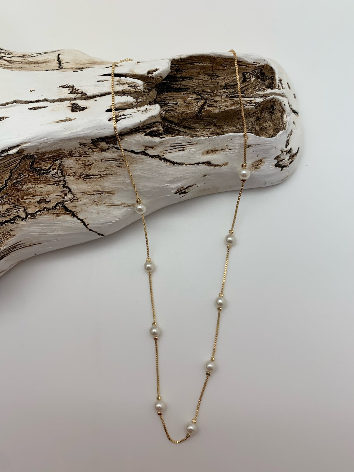 Simple gold and pearl chain