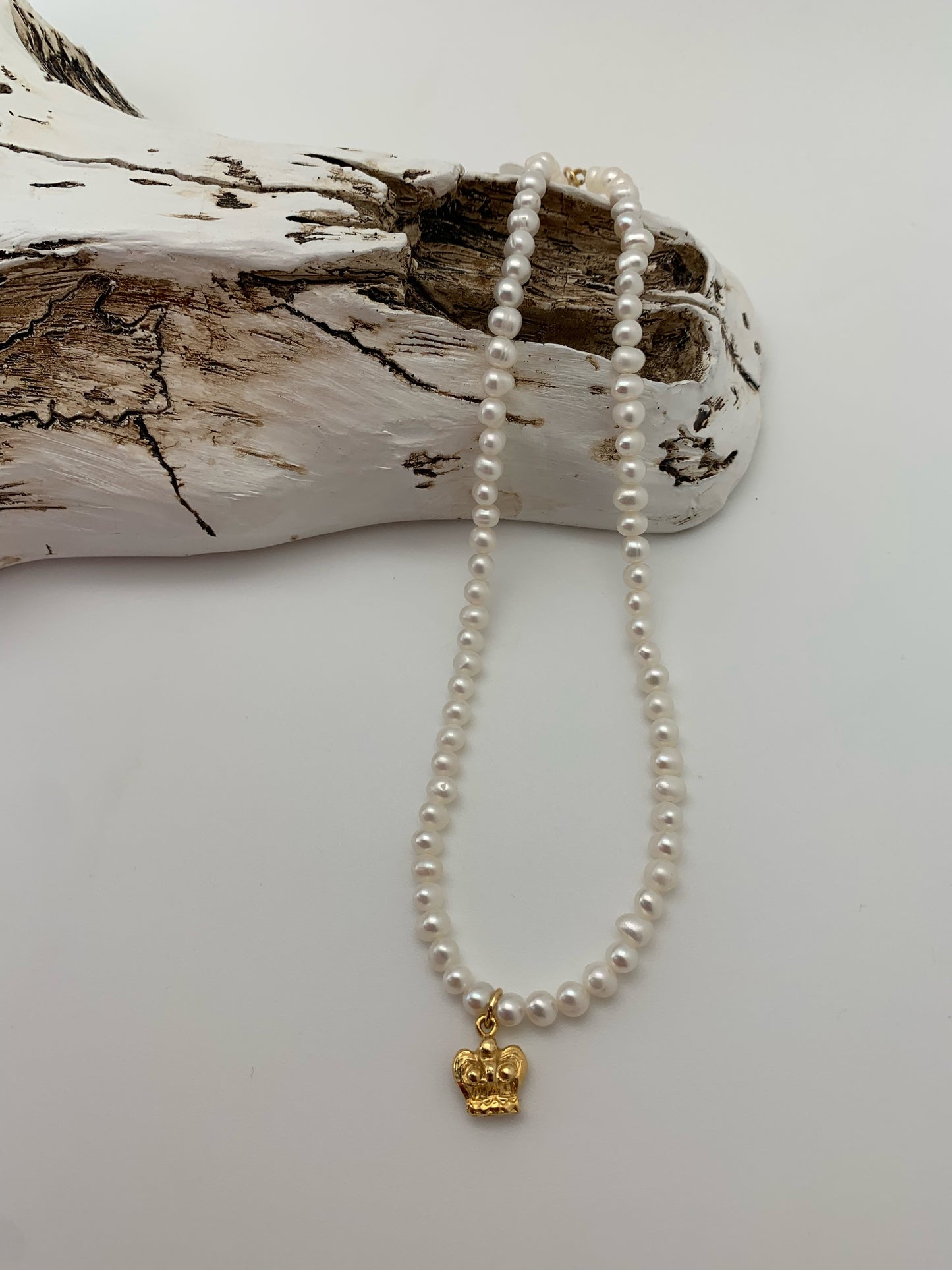 Mini pearls with gold angel