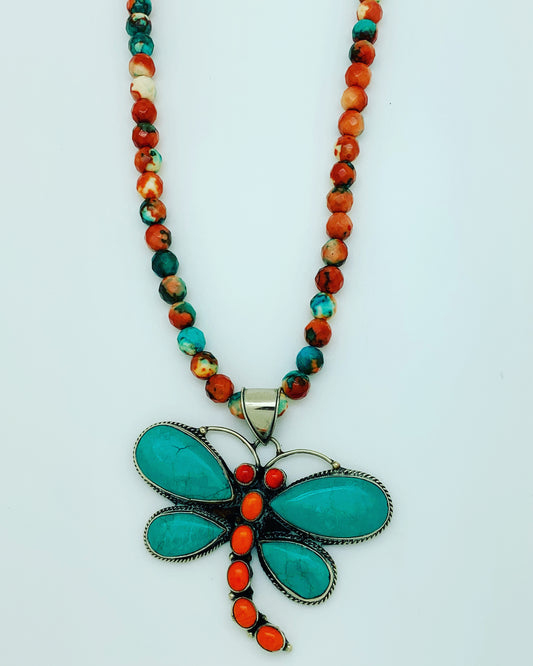 Orange, turquoise and white howlite beads with Tibetan dragonfly
