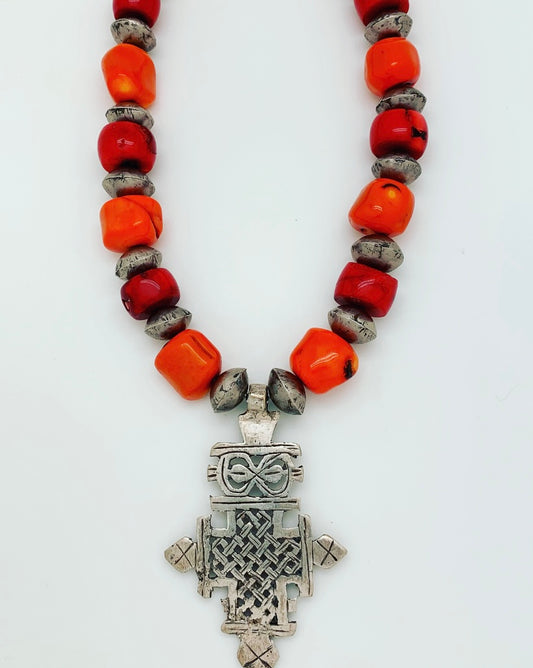 Chunky red and orange coral with African silver and cross pendant
