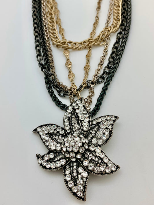 5 strand multi colored chain with crystal encrusted brooch