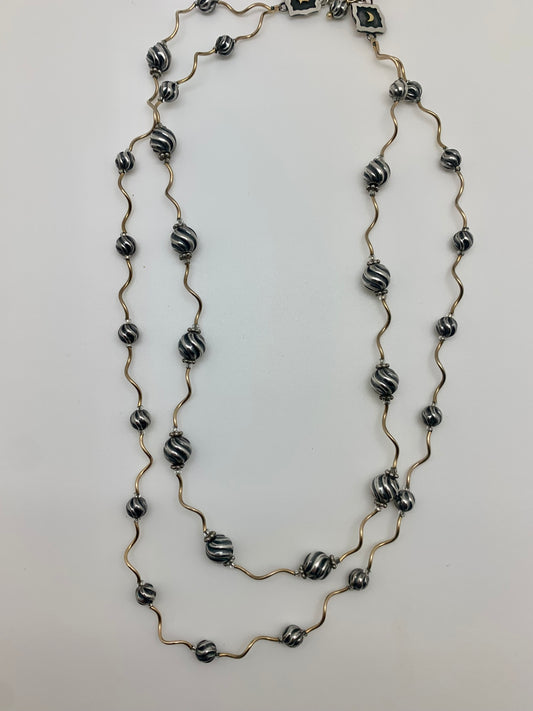 Swirl Navajo pearls on curled gold tubes