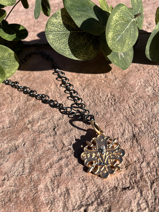 Gun metal chain with gold cross