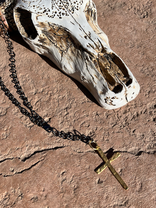 Long gun metal chain with skinny gold cross
