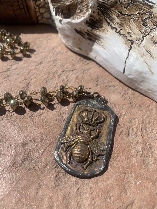 Long gold with bee pendant