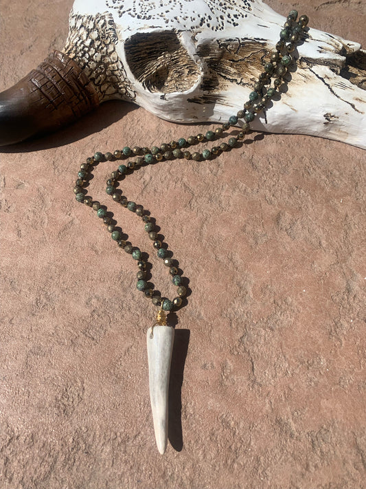 Gold and green stones with turquoise